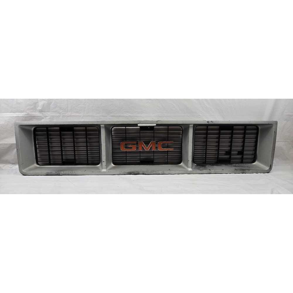 73-80 GMC C/K Pickup Jimmy Suburban OEM Front Grille Orange Emblem Vintage
